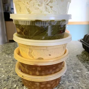 Side of coleslaw, collard greens, potato salad, baked beans