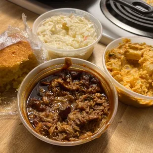 Cornbread, coleslaw, potato salad, &amp; pulled pork.