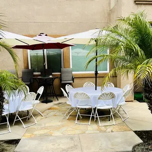 Round tables with umbrellas