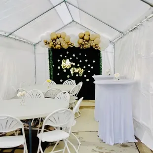 10x30 tent, cocktail tables and backdrop