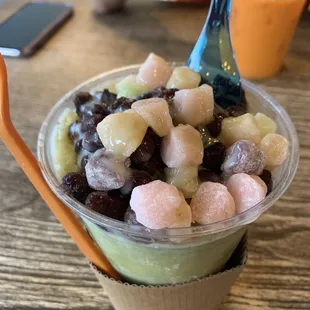 Mochi shaved ice? Presentation nothing like the photos they advertise, looks unappetizing