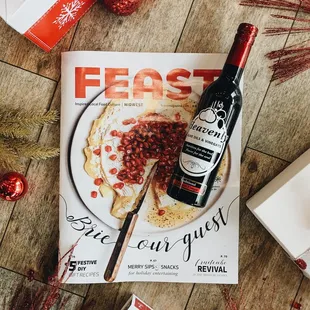 a plate of food and a bottle of wine