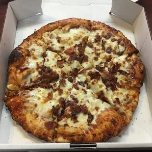 a pizza in a pizza box
