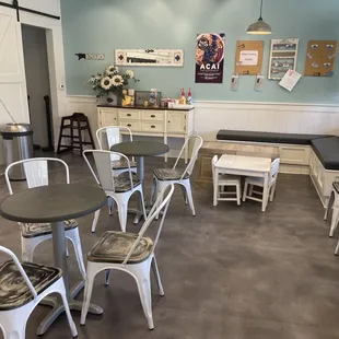 a large room with tables and chairs