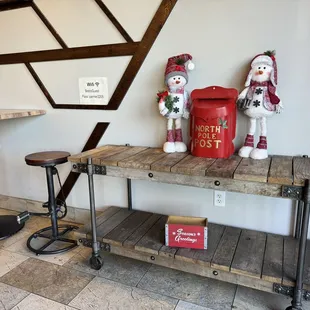a table with two snowmen on it