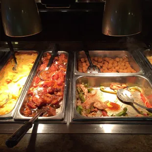 Meatloaf, scalloped potatoes, candied yams, and fajitas.