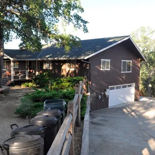 Front of the house on the left lower garage is game room and access to lower deck and living room.