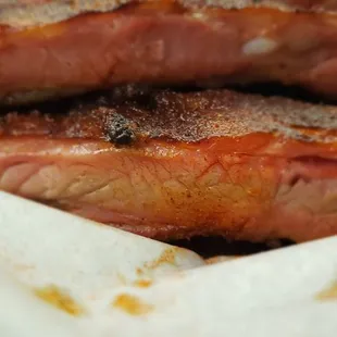 The ribs have tips on and a nice smoke ring