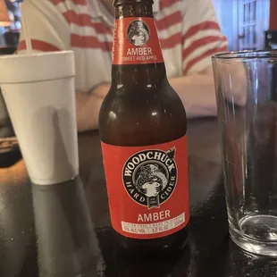 Fountain drink cup and a Woodchuck hard cider