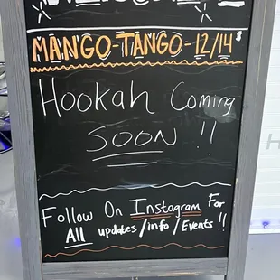 a chalk board with a welcome sign