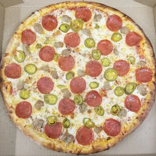 Backfire: Signature pizza sauce, crushed red pepper, pepperoni, sausage, and jalapeno