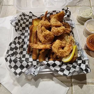 Shrimp basket. Good size shrimp. Fries and bread. Special sauce is awesome.