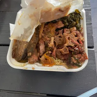 Soul sampler for 25 dollars: Turkey wings, ox tails, meatloaf with greens, mashed potatoes, and mac and cheese. We ate 3 meals off this