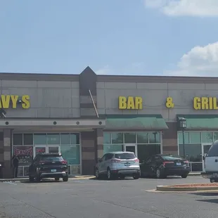 cars parked in front of the restaurant