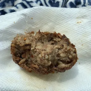 a muffin on a napkin