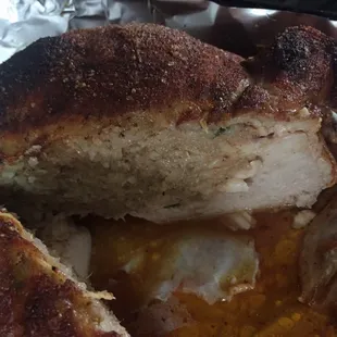 The in side of my debone boudin stuffed chicken it was stuffed a bunch. Love there food