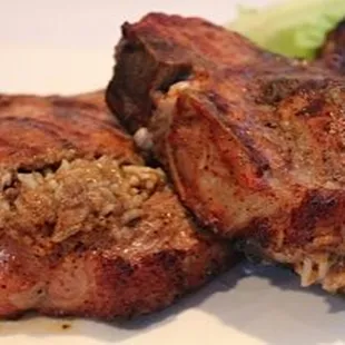 Stuffed Pork Chops: Stuffed with your choice of Cornbread Dressing, Rice Dressing, or Pork Dressing (Sausage).