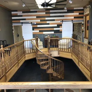 a spiral staircase in a coffeehouse