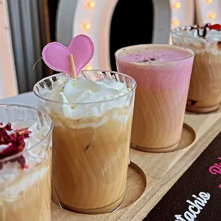 Valentine&apos;s Day themed coffee flight! (Left to right: La Vie en Rose, Pistachio, Pink Velvet, and Cherry Cordial)