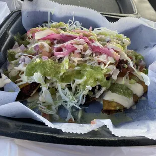 Tacos dorados de camarón with veggies.