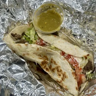 -Steak burrito (w/ lettuce, tomato, cheese, sour cream, and refried beans) -spicy verde salsa