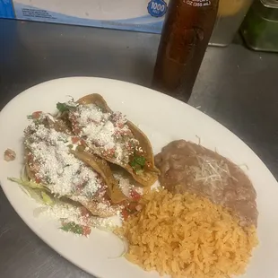 2 potato tacos with rice and beans