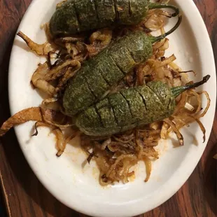 a plate of stuffed peppers