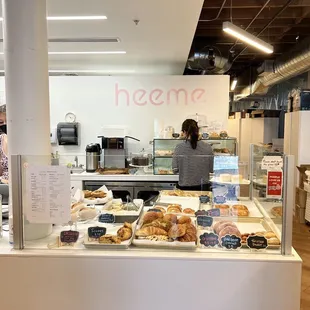a woman standing in front of the counter