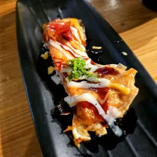 a plate of sushi on a table