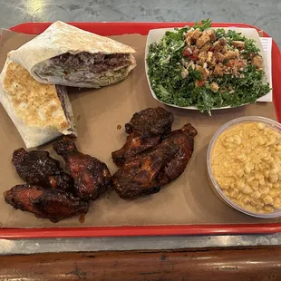 -6 pc &apos;smoked &amp; fried&apos; chicken wings and brisket crunchwrap  -Sides: esquites and crunchy kale slaw