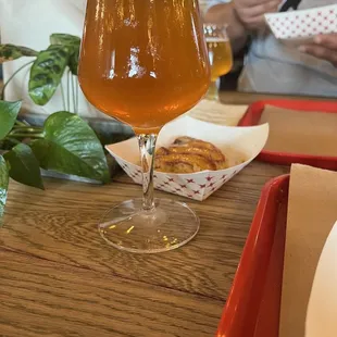 a glass of beer on a table