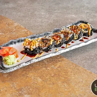 a sushi roll on a plate