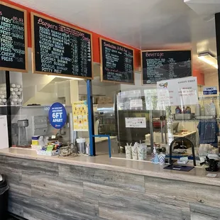 a restaurant counter with menus