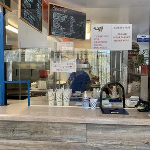 a man working at a restaurant counter