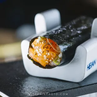 a sushi roll on a plate
