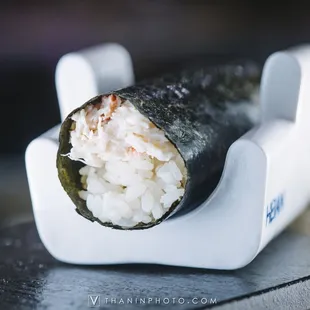 a sushi roll on a plate