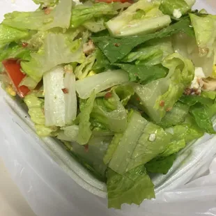 Half Cobb salad, spilling over $6.00