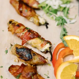 Jalapenos wrapped with bacon and stuffed with cream cheese? Stop playing...I'll tear this up live.