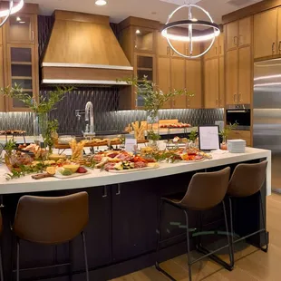 Our famous charcuterie station is a perfect thing to add to your next open house.