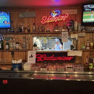 a bar with a television in the background