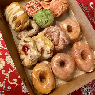 Glazed Donuts, Pistachio Muffin, Strawberry Muffin, Raspberry Danish, Blueberry Donut.