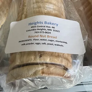 a sandwich wrapped in plastic