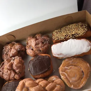 The apple fritters, Long Johns, twists, glazed cinnamon rolls, and custard bismarks