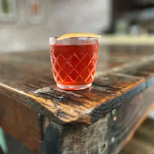 a drink on a wooden table