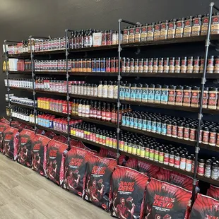 Right side of store featuring an assortment or rubs, sauces, and charcoal.