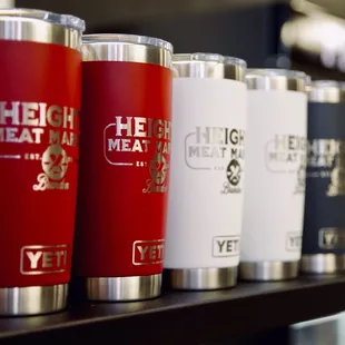 a row of red and white cups