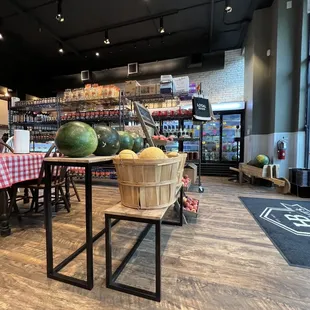 Watermelons and peaches - and check out the refrigerated foods in the background  (6/18/2022)