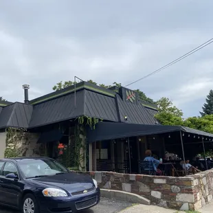 a car parked in front of the building