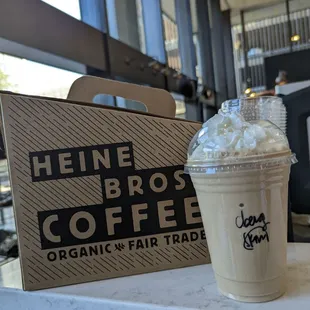 a cup of coffee with whipped cream