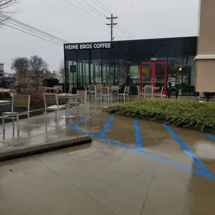 outside handicap parking space and tables blocking access